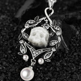 Spectral Echo Pearl Skull Necklace